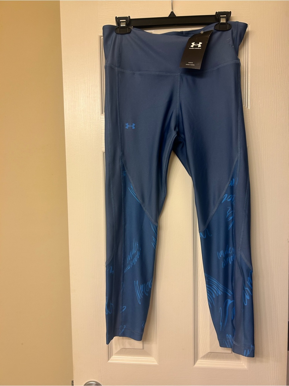 Under Armour women’s Navy Blue Performance Leggings with Light Blue Accents